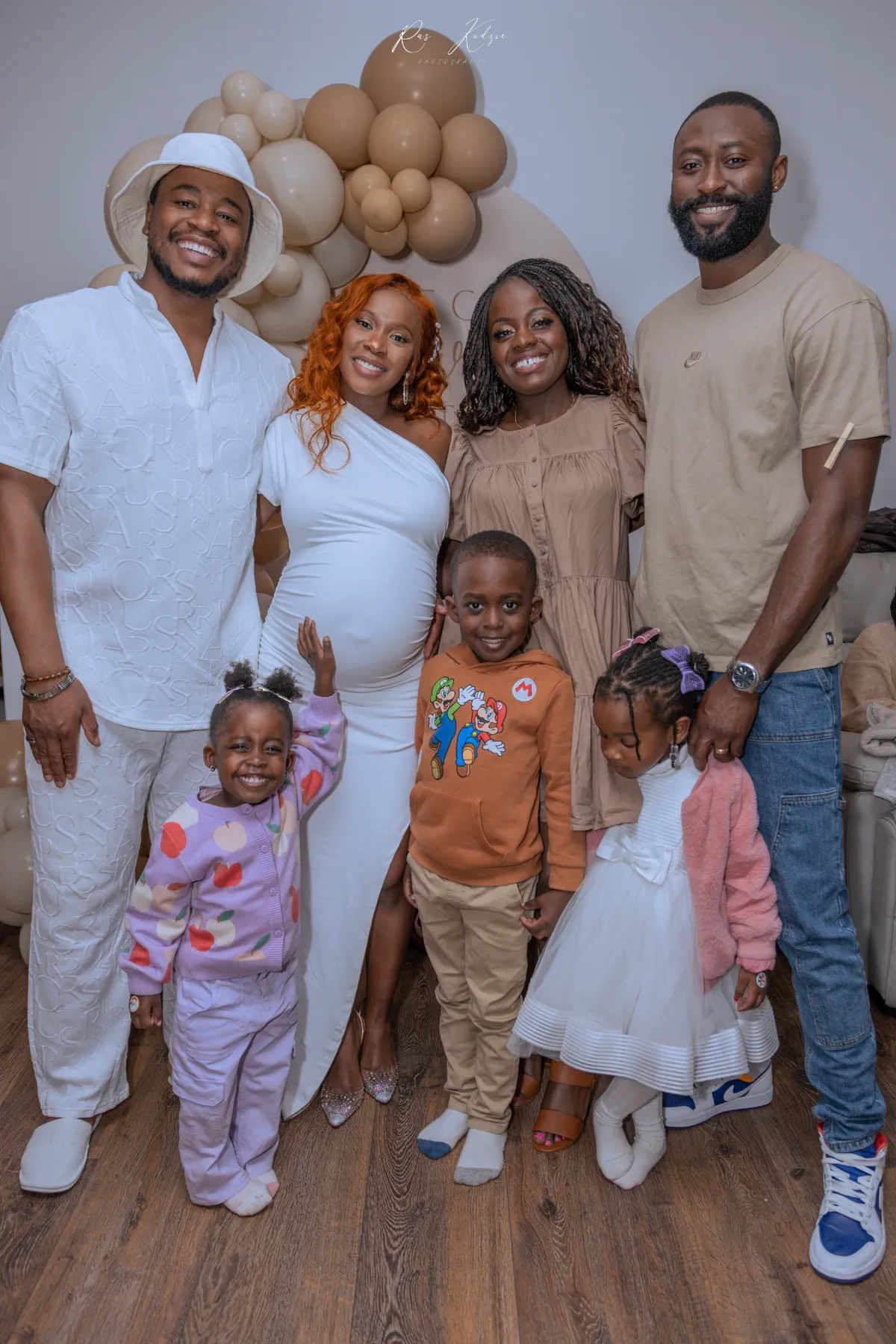 Family and children gathered for a group portrait