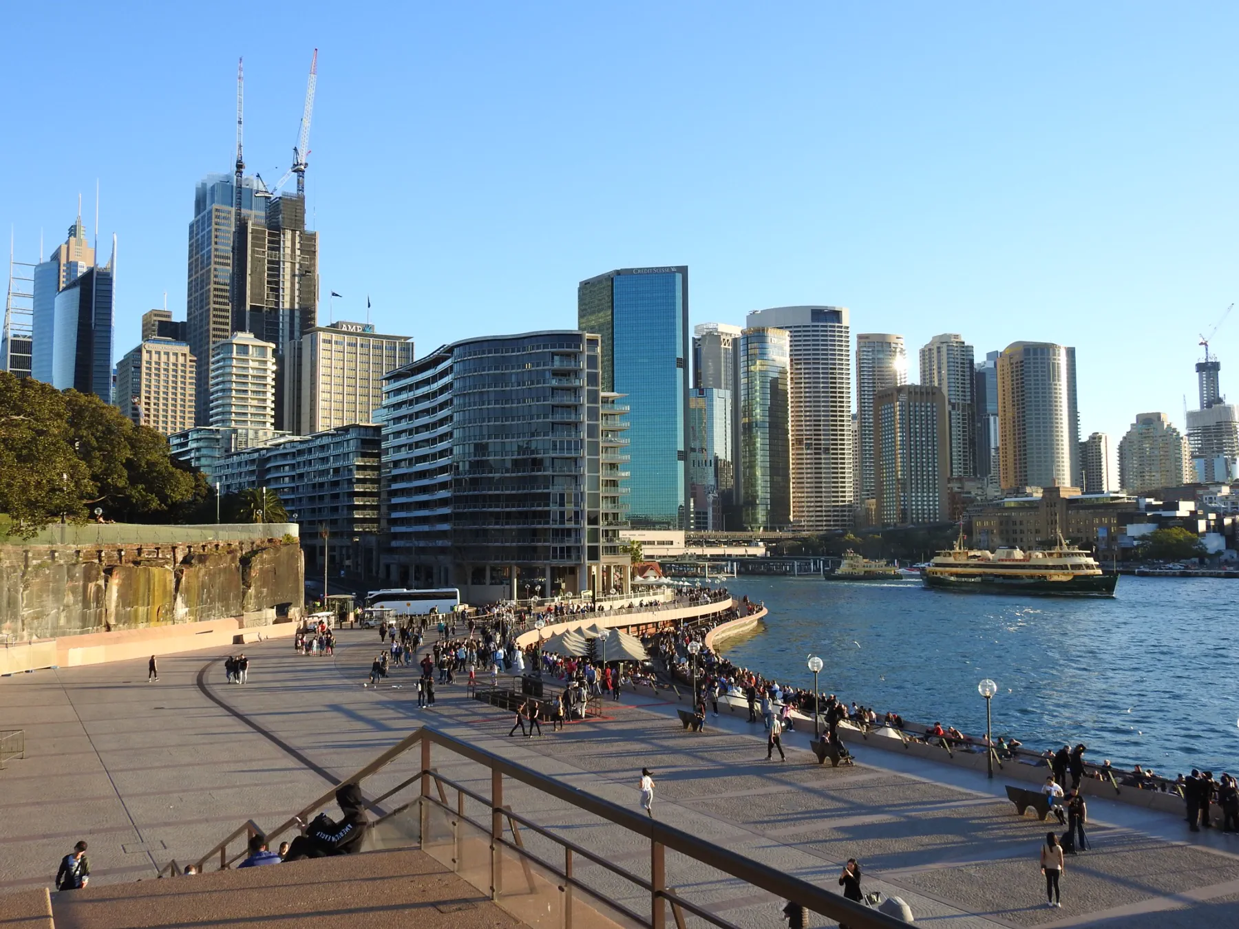 Circular Quay and the Sydney skyline glowing in late afternoon light